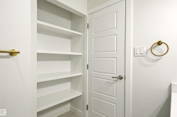 Built-in open shelving with multiple tiers provides ample storage - 