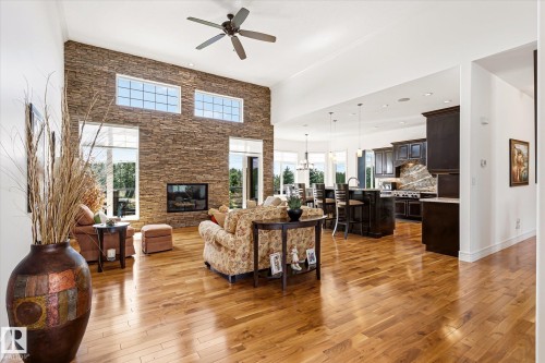 3 Blackhawk Drive, Rural Parkland County, AB - Indoor Photo Showing Living Room With Fireplace