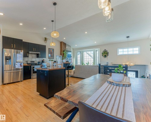 Open-concept living space featuring wood-finish flooring throughout - 4804 64 Avenue, Cold Lake, AB 