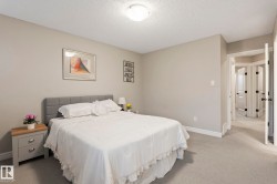 Carpeted bedroom with a neutral color palette - 