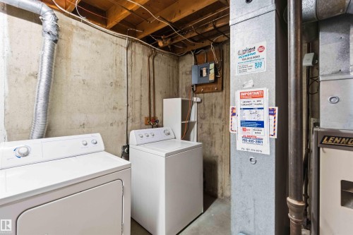 Utility area with concrete walls and exposed wood ceiling joists - 3312 106 Avenue, Edmonton, AB 