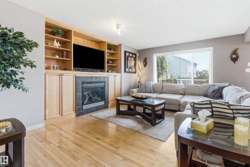 7307 Singer Way, Edmonton, AB - Indoor Photo Showing Living Room With Fireplace