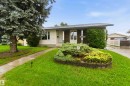 Single-story residence featuring light-colored siding and brick accents - 17303 107 Street, Edmonton, AB 