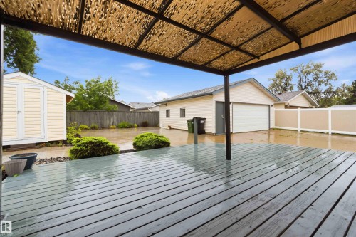 Expansive wood-finish deck with a covered pergola - 17303 107 Street, Edmonton, AB 