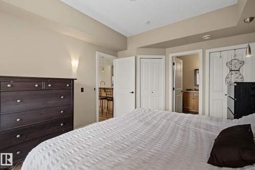 Bedroom with neutral wall tones and recessed lighting - 30 2565 Hanna Crescent, Edmonton, AB 