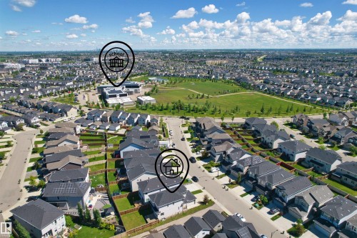 Aerial view of a residential community with a central green space - 4673 Alwood Way, Edmonton, AB 