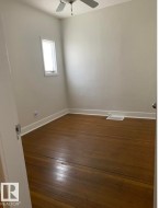 Primary Bedroom With Hardwood Flooring - 