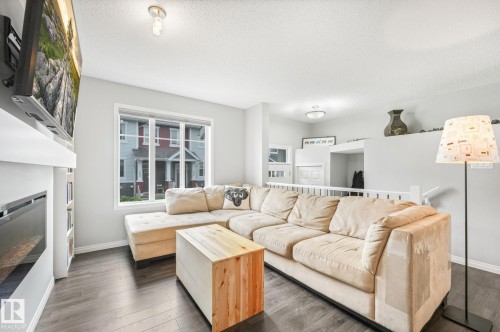#109 2905 141 St Sw, Edmonton, AB - Indoor Photo Showing Living Room With Fireplace