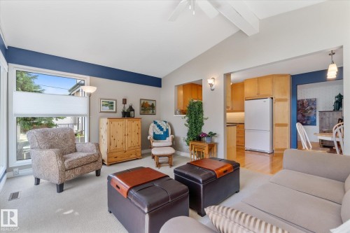 Vaulted ceiling with exposed beam and ceiling fan - 14309 101 Avenue, Edmonton, AB 