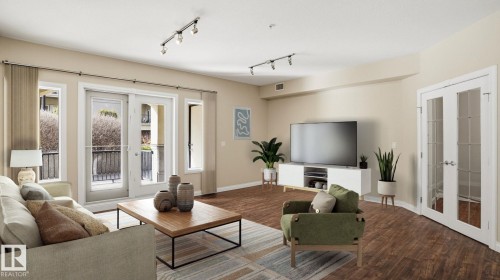 138 1406 Hodgson Way, Edmonton, AB - Indoor Photo Showing Living Room