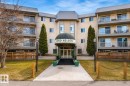 Multi-story building featuring balconies with metal railings - #223 5125 Riverbend Rd Nw, Edmonton, AB  - Outdoor With Balcony With Facade 