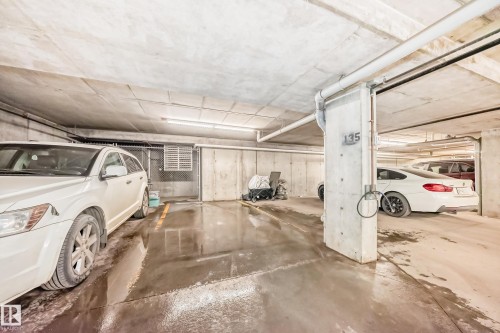 Underground parking space featuring concrete flooring and exposed piping - 311 142 Ebbers Boulevard, Edmonton, AB 