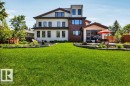 Expansive rear lawn framed by tiered landscaping - 8914 120 Street, Edmonton, AB 