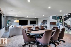 Spacious recreation room featuring recessed lighting and a large entertainment area - 