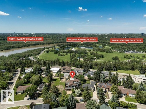 Aerial perspective highlighting the property within a verdant setting - 8914 120 Street, Edmonton, AB 