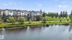 Modern multi-story townhomes featuring balconies and a variety of exterior finishes - 