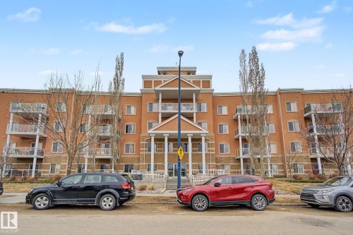 Multi-story building featuring a stucco and brick facade - 415 263 Macewan Road, Edmonton, AB 