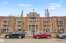 Multi-story building featuring a stucco and brick facade - 415 263 Macewan Road, Edmonton, AB 