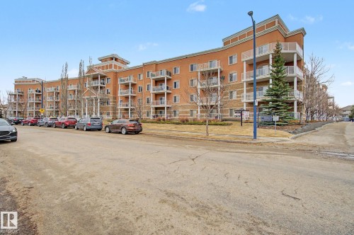 Multi-story residential building featuring brick and stone veneer siding - 415 263 Macewan Road, Edmonton, AB 