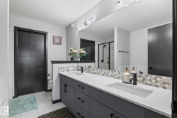 Dual vanity with integrated sinks and white countertops - 