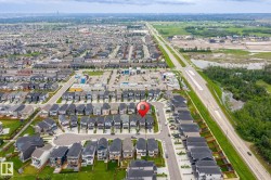Aerial perspective showcasing a residential neighborhood with varied housing styles - 
