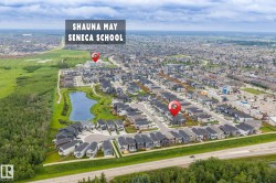 Aerial view showcasing a residential development with varied housing styles - 