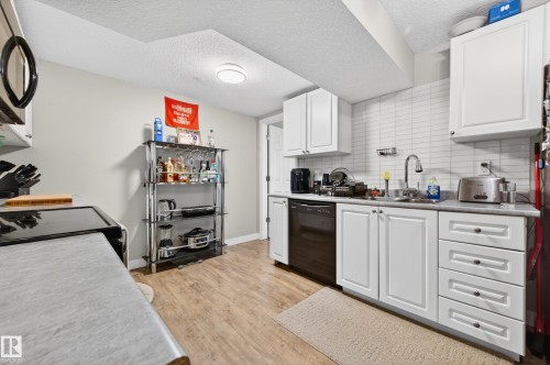 3412 142 Avenue, Edmonton, AB - Indoor Photo Showing Kitchen With Double Sink