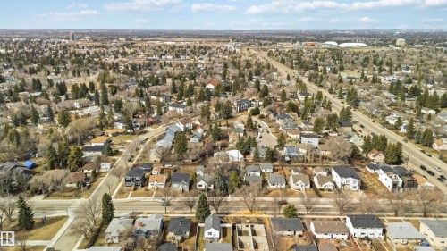 Expansive aerial perspective showcasing a residential area with varied housing styles - 6036 106 Street, Edmonton, AB 