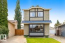 Two-story stucco exterior with decorative timber accents - 18609 54 Avenue, Edmonton, AB 