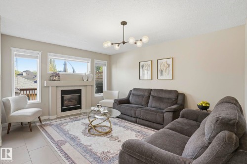 2049 Tanner Wynd Nw, Edmonton, AB - Indoor Photo Showing Living Room With Fireplace