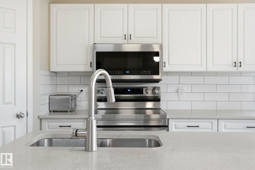 2049 Tanner Wynd Nw, Edmonton, AB - Indoor Photo Showing Kitchen With Double Sink With Upgraded Kitchen