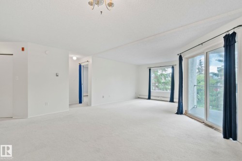 #318 17109 67 Av Nw, Edmonton, AB - Indoor Photo Showing Other Room