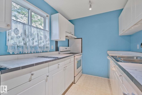 #318 17109 67 Av Nw, Edmonton, AB - Indoor Photo Showing Kitchen With Double Sink