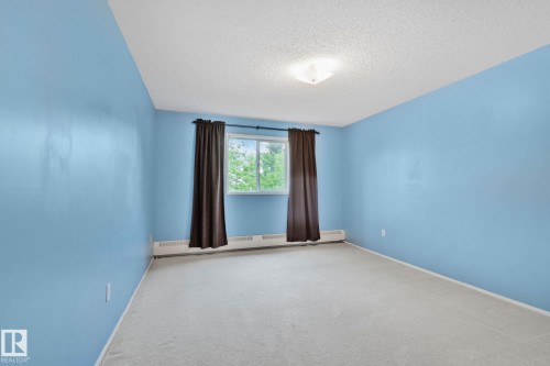 #318 17109 67 Av Nw, Edmonton, AB - Indoor Photo Showing Other Room