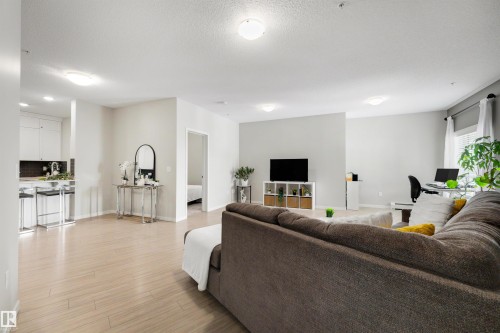 437 1818 Rutherford Road, Edmonton, AB - Indoor Photo Showing Living Room
