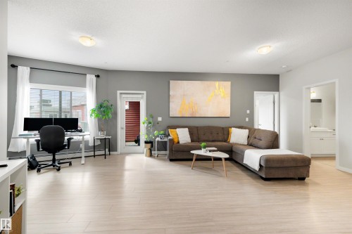 437 1818 Rutherford Road, Edmonton, AB - Indoor Photo Showing Living Room