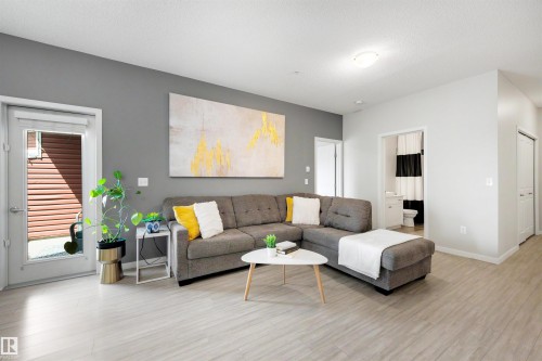 437 1818 Rutherford Road, Edmonton, AB - Indoor Photo Showing Living Room