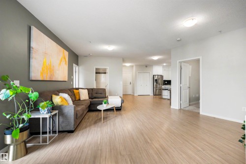 437 1818 Rutherford Road, Edmonton, AB - Indoor Photo Showing Living Room