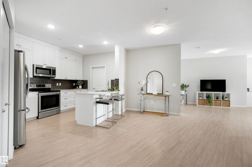 437 1818 Rutherford Road, Edmonton, AB - Indoor Photo Showing Kitchen With Stainless Steel Kitchen