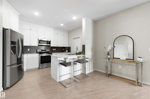 437 1818 Rutherford Road, Edmonton, AB - Indoor Photo Showing Kitchen With Stainless Steel Kitchen