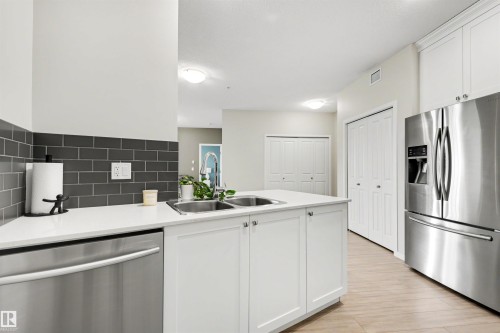 437 1818 Rutherford Road, Edmonton, AB - Indoor Photo Showing Kitchen With Stainless Steel Kitchen With Double Sink