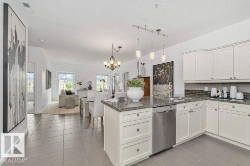 #302 160 Magrath Rd Nw, Edmonton, AB - Indoor Photo Showing Kitchen With Upgraded Kitchen