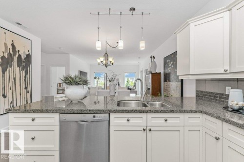 #302 160 Magrath Rd Nw, Edmonton, AB - Indoor Photo Showing Kitchen With Double Sink With Upgraded Kitchen
