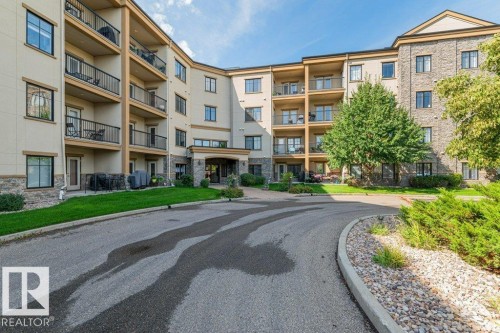 #302 160 Magrath Rd Nw, Edmonton, AB - Outdoor With Balcony With Facade