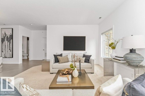 #302 160 Magrath Rd Nw, Edmonton, AB - Indoor Photo Showing Living Room