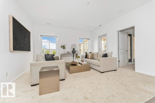 #302 160 Magrath Rd Nw, Edmonton, AB - Indoor Photo Showing Living Room
