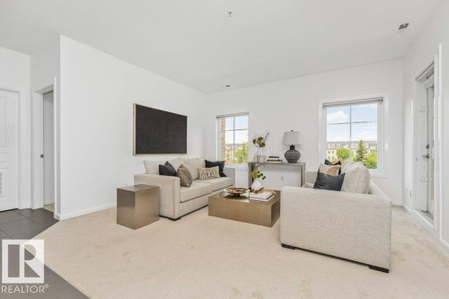 #302 160 Magrath Rd Nw, Edmonton, AB - Indoor Photo Showing Living Room