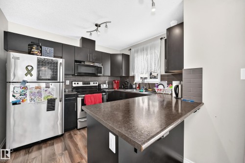 #21 8716 179 Av Nw, Edmonton, AB - Indoor Photo Showing Kitchen
