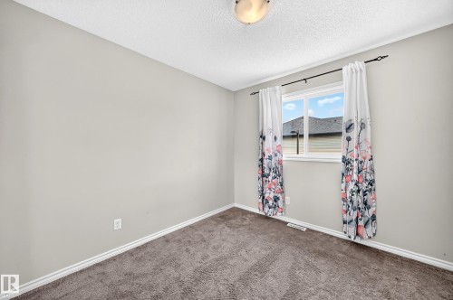 #21 8716 179 Av Nw, Edmonton, AB - Indoor Photo Showing Other Room