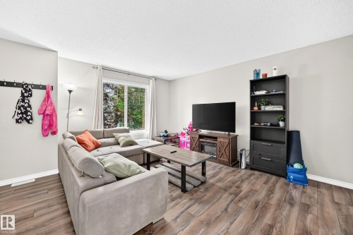#21 8716 179 Av Nw, Edmonton, AB - Indoor Photo Showing Living Room